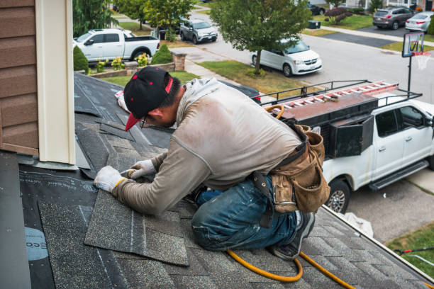Professional Roofing technician working in Moro, OR